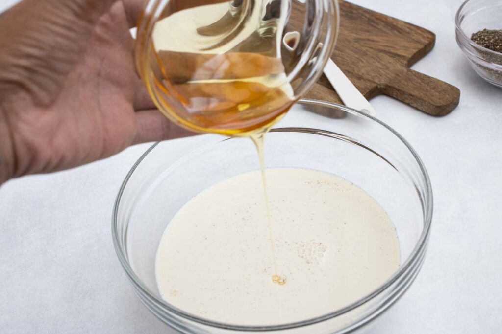 honey being poured into oat milk